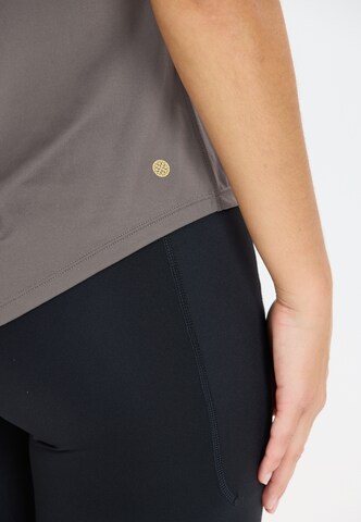 Athlecia Functioneel shirt 'Gaina' in Bruin