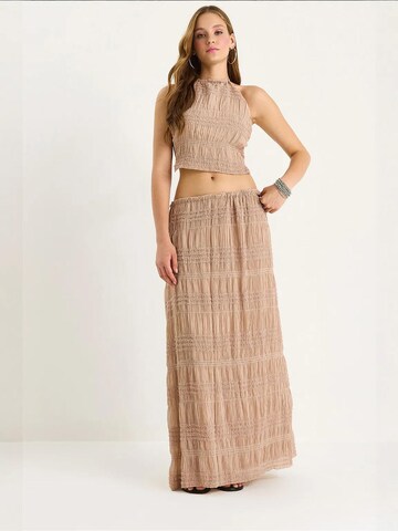 Completo pantalone di Bianco Lucci in rosa