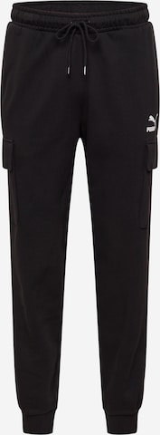 Tapered Pantaloni cu buzunare de la PUMA pe negru: față