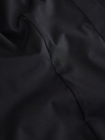 Next - Blusa 'Essential' en negro