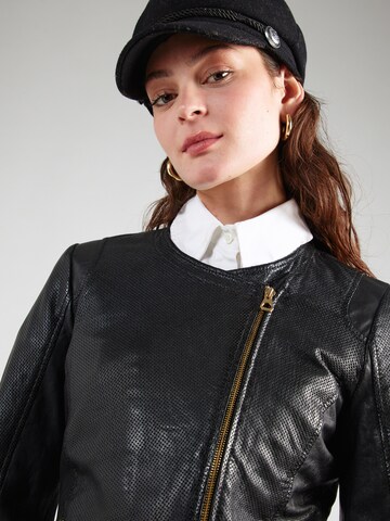 Veste mi-saison 'Sinja' Gipsy by Mauritius en noir