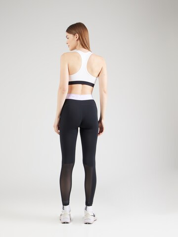 NIKE Skinny Sporthose 'Nike Pro' in Schwarz