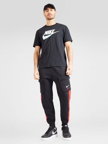 Tapered Pantaloni cu buzunare 'AIR' de la Nike Sportswear pe negru