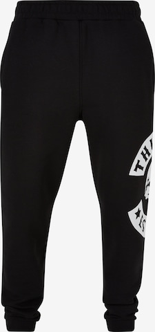 Thug Life Tapered Pants in Black: front