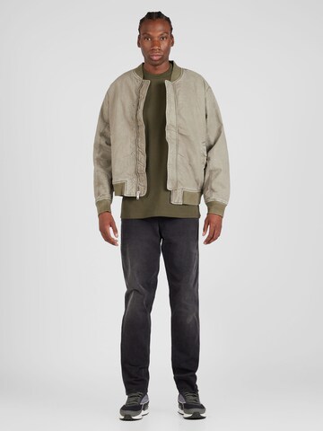 Maglietta 'American Script' di Carhartt WIP in verde