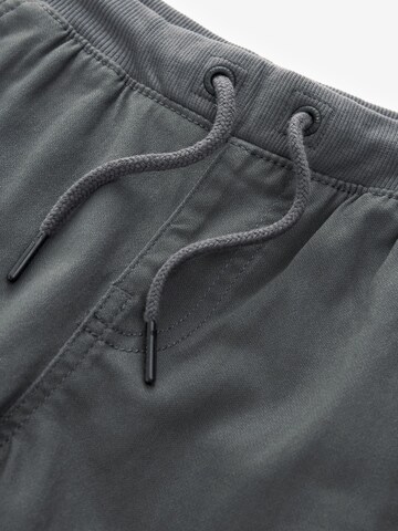 regular Pantaloni di Next in grigio