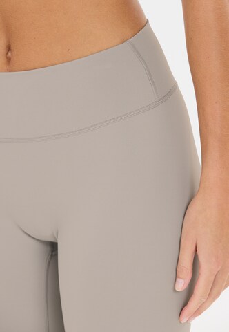 Athlecia Skinny Workout Pants 'Luxe' in Blue
