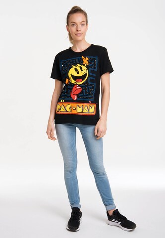 LOGOSHIRT Shirt 'Pac-Man – Jumping' in Zwart