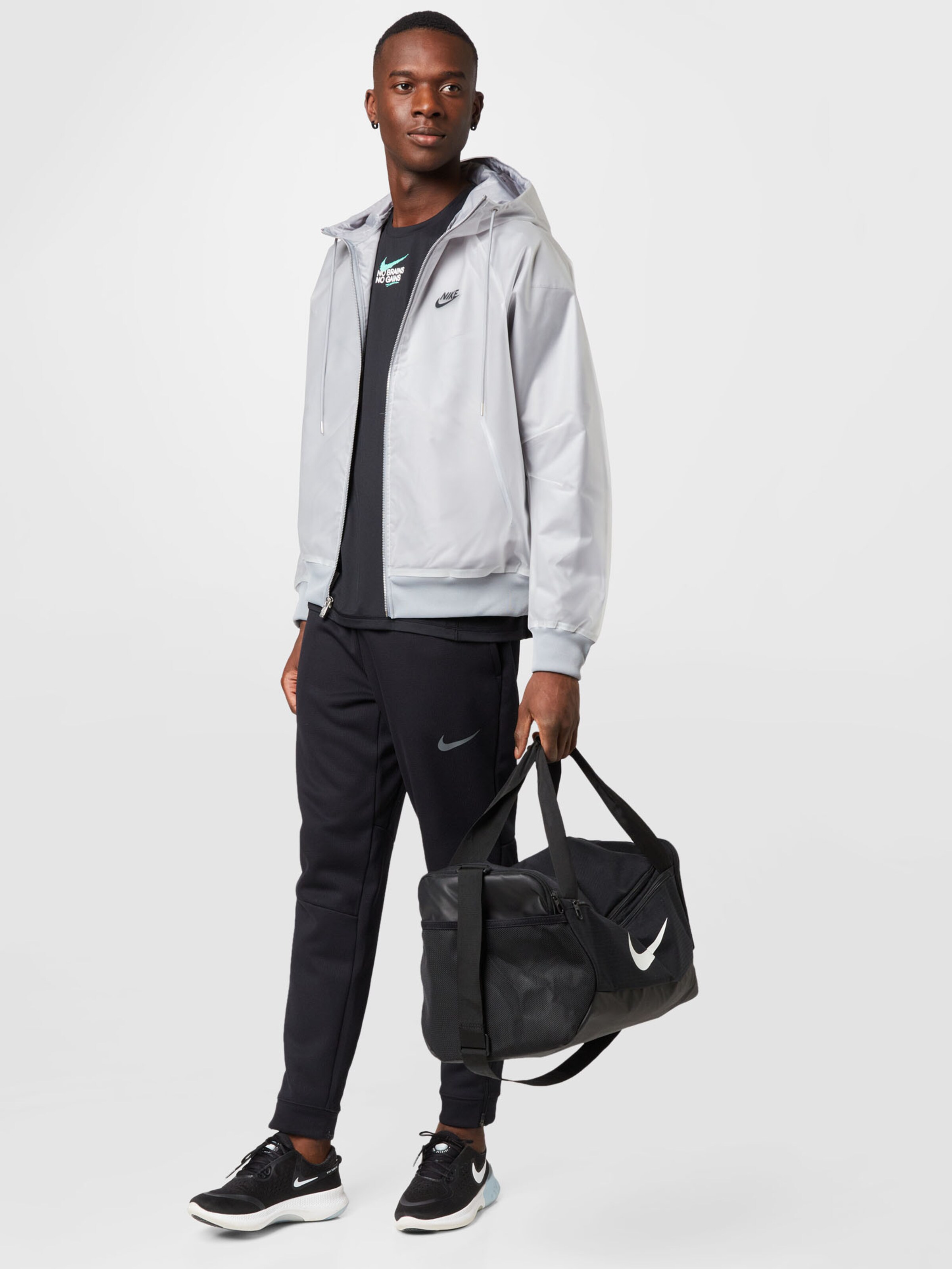 Nike Sportswear Between Season Jacket CIRCA WINDRUNNER in Grey ABOUT YOU