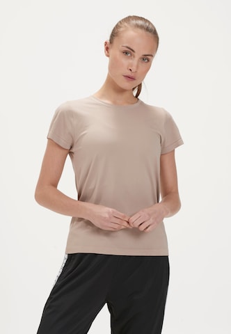 Athlecia Performance Shirt in Beige: front