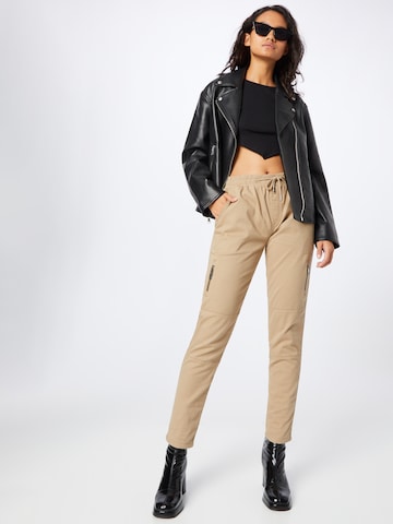 Cartoon Tapered Broek in Beige