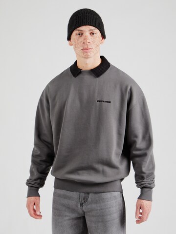 Pegador - Sweatshirt em cinzento: frente