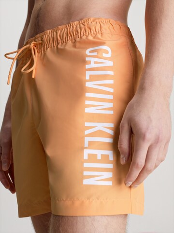 Calvin Klein Swimwear Board Shorts ' Intense Power ' in Orange