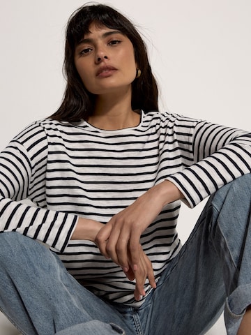 Chemisier ' ' Apricot en blanc