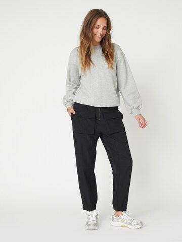 co'couture Tapered Housut 'Luna' värissä musta