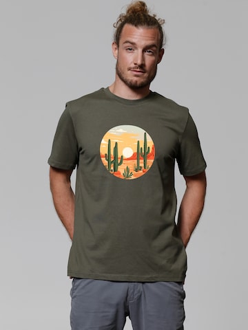 Maglietta 'Sonnenuntergang in der Wüste' di Watapparel in verde: frontale