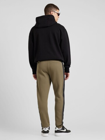 Effilé Pantalon 'Mickey' GUESS en vert