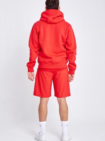 SPORTKIND - Chaqueta deportiva 'Unisex Zip Hoodie' en rojo