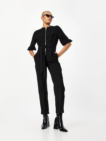 Tuta jumpsuit di Warehouse in nero