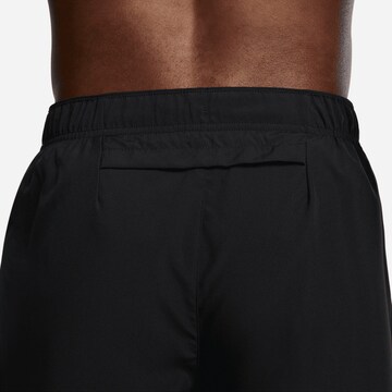 NIKE Regular Workout Pants in Black