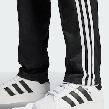 ADIDAS ORIGINALS regular Παντελόνι 'Montreal' σε μαύρο