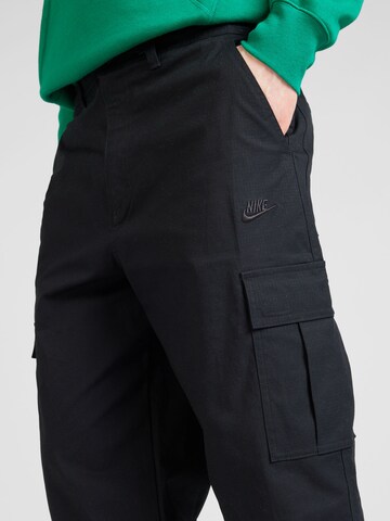 Regular Pantaloni cu buzunare 'Club' de la Nike Sportswear pe negru