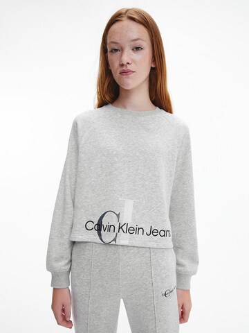 Calvin Klein Jeans Sweatshirt in Grau: predná strana
