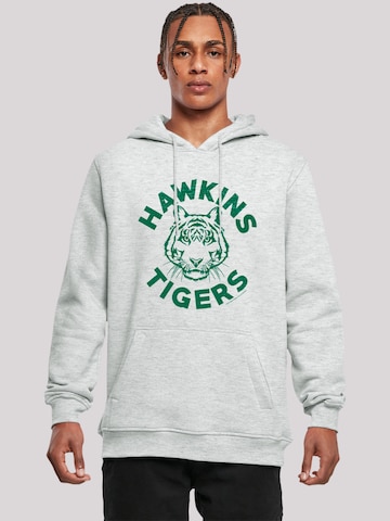 F4NT4STIC Sweatshirt 'Stranger Things Hawkins Tigers Netflix TV Series' in Grijs: voorkant