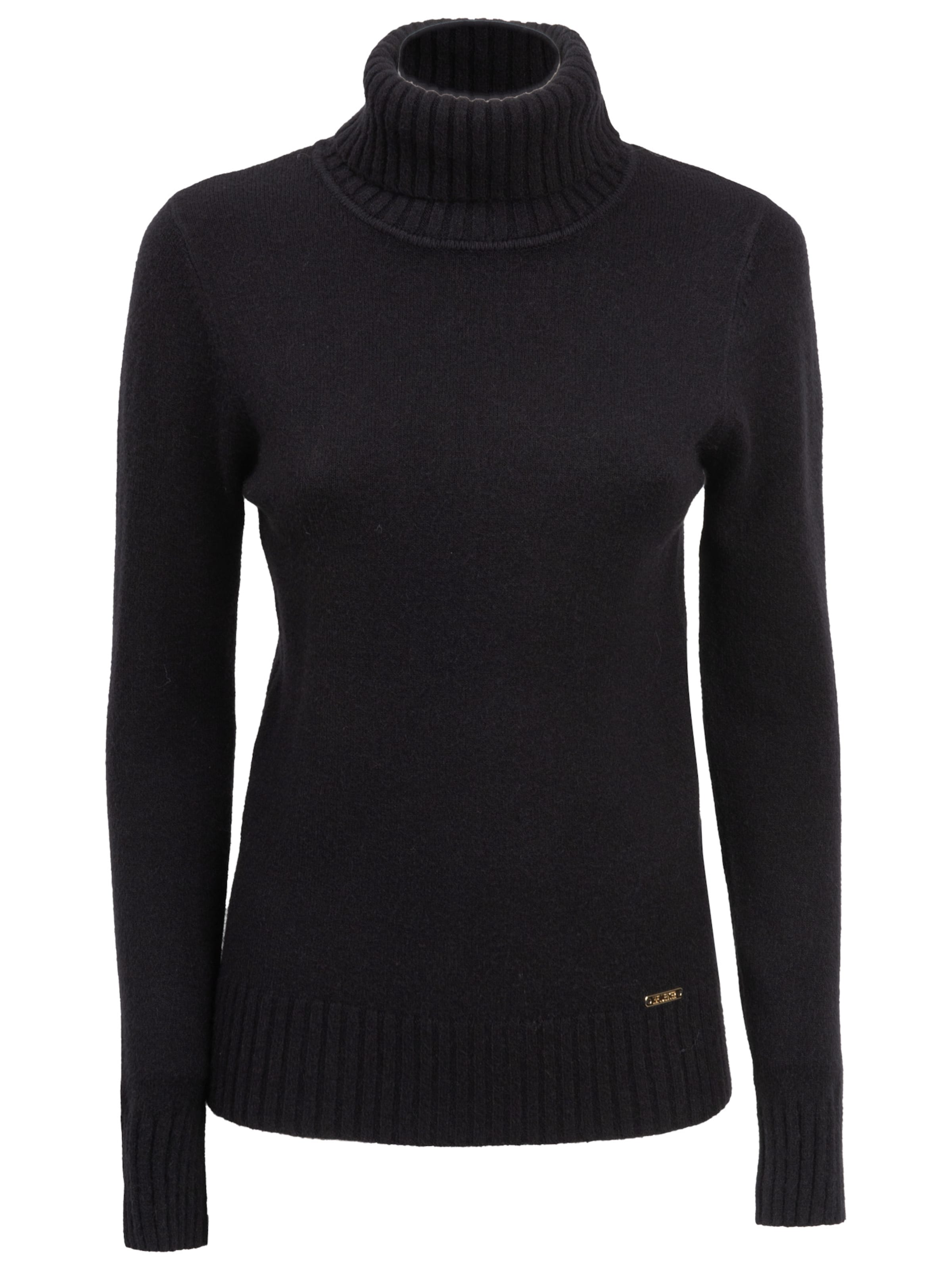 Influencer Πουλόβερ σε μαύρο: μπροστά