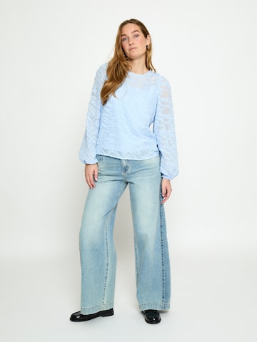 Top 'Odine' di minus in blu