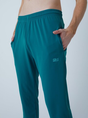 Coupe slim Pantalon de sport 'Slim Training Pants' SPORTKIND en vert