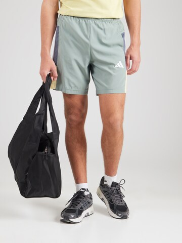 ADIDAS PERFORMANCE Regular Sports trousers 'TR ESS' in Green: front