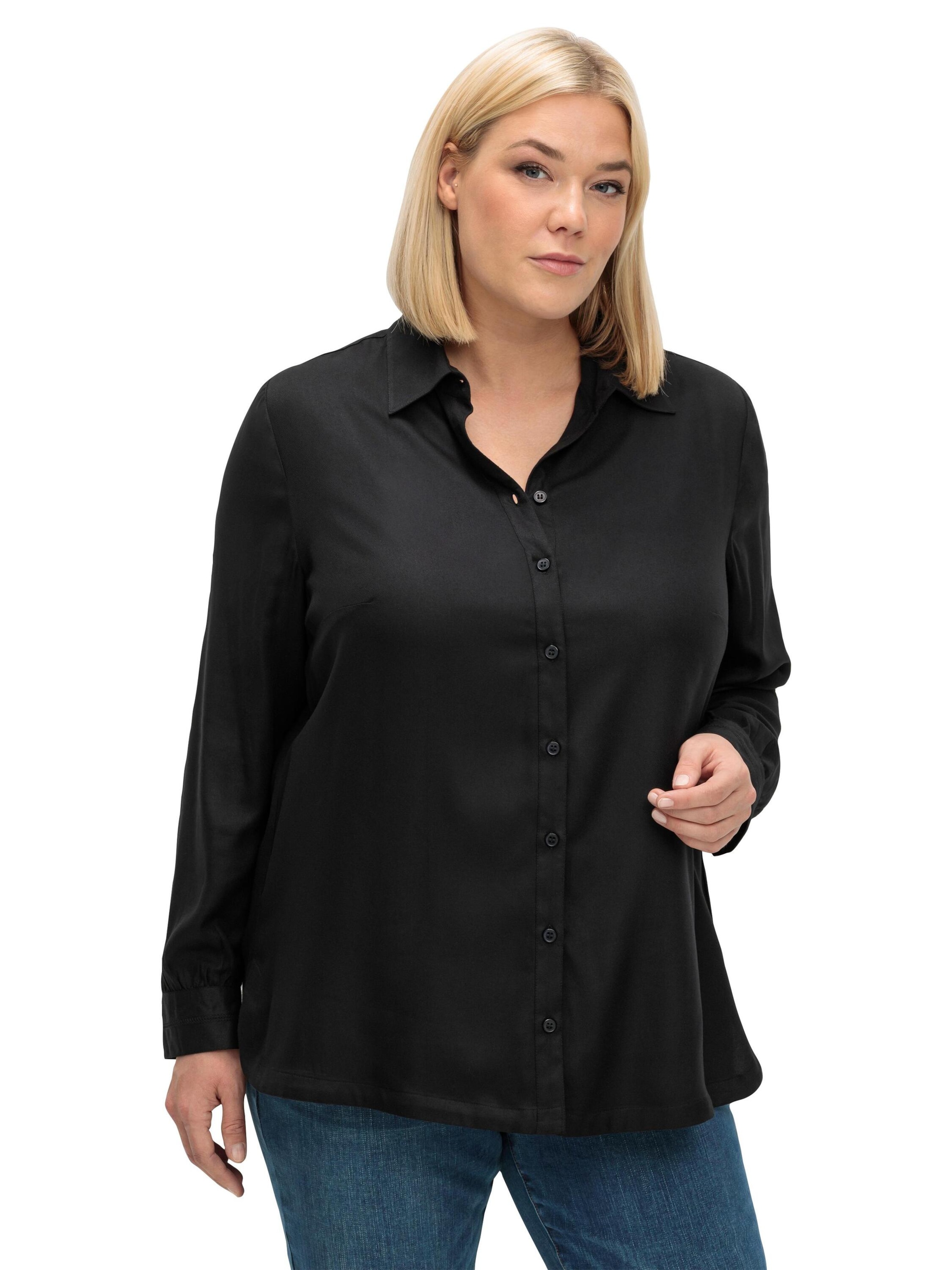 SHEEGO - Blusa en negro: frente