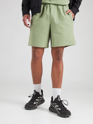 Largi Pantaloni de la new balance pe verde: față