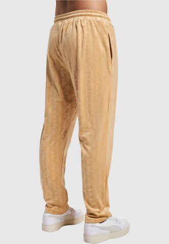 Regular Pantalon Karl Kani en beige