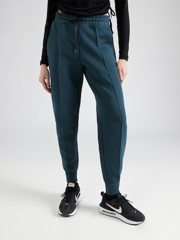 Nike Sportswear Tapered Nadrág - zöld: elől