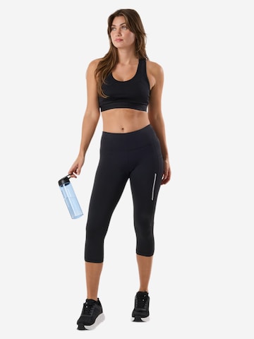 SWEDEMOUNT Skinny Sportbroek 'Core' in Zwart: voorkant