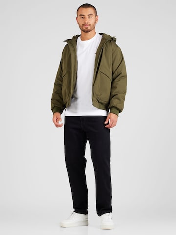 ABOUT YOU Between-Season Jacket 'Jannek' in Green