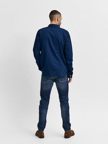 Coupe slim Jean 'Leon' SELECTED HOMME en bleu