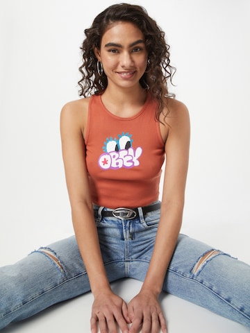 Obey Top in Orange