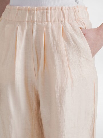 DEHA Baggy Broek 'Shiny' in Oranje