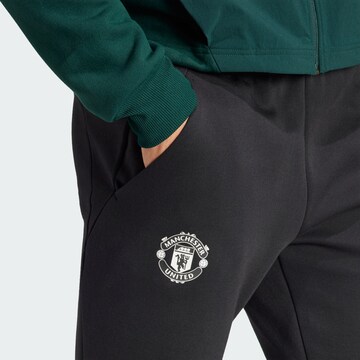 ADIDAS SPORTSWEAR Tapered Sportbroek 'Manchester United Designed for Gameday' in Zwart