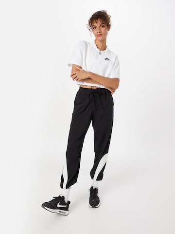 Nike Sportswear Zwężany krój Spodnie 'Circa 50' w kolorze czarny
