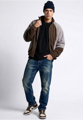 Giacca di pile di Urban Classics in marrone
