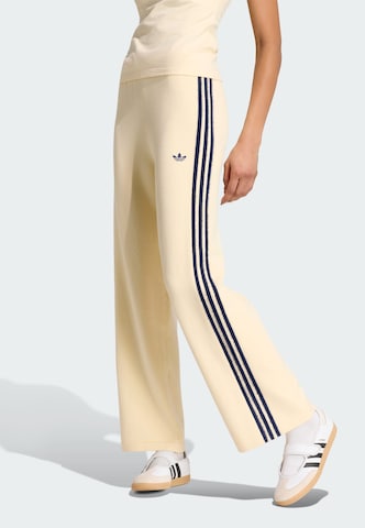 ADIDAS ORIGINALS - Loosefit Calças 'Firebird' em amarelo: frente