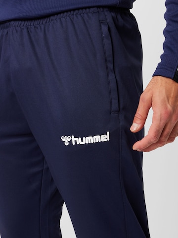 Hummel Zúžený strih Športové nohavice - Modrá
