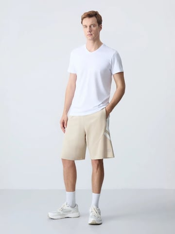 Regular Pantalon Tommy Life en mélange de couleurs