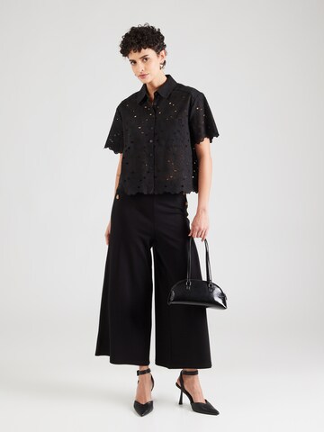 King Louie Bluse 'Evelina' i sort