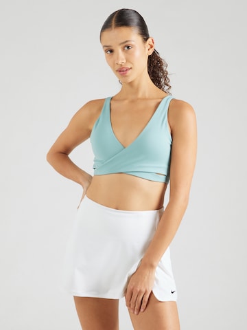 NIKE Спортивный топ в Зеленый: спереди