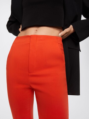 MANGO Normální Kalhoty s puky 'Dora' – oranžová